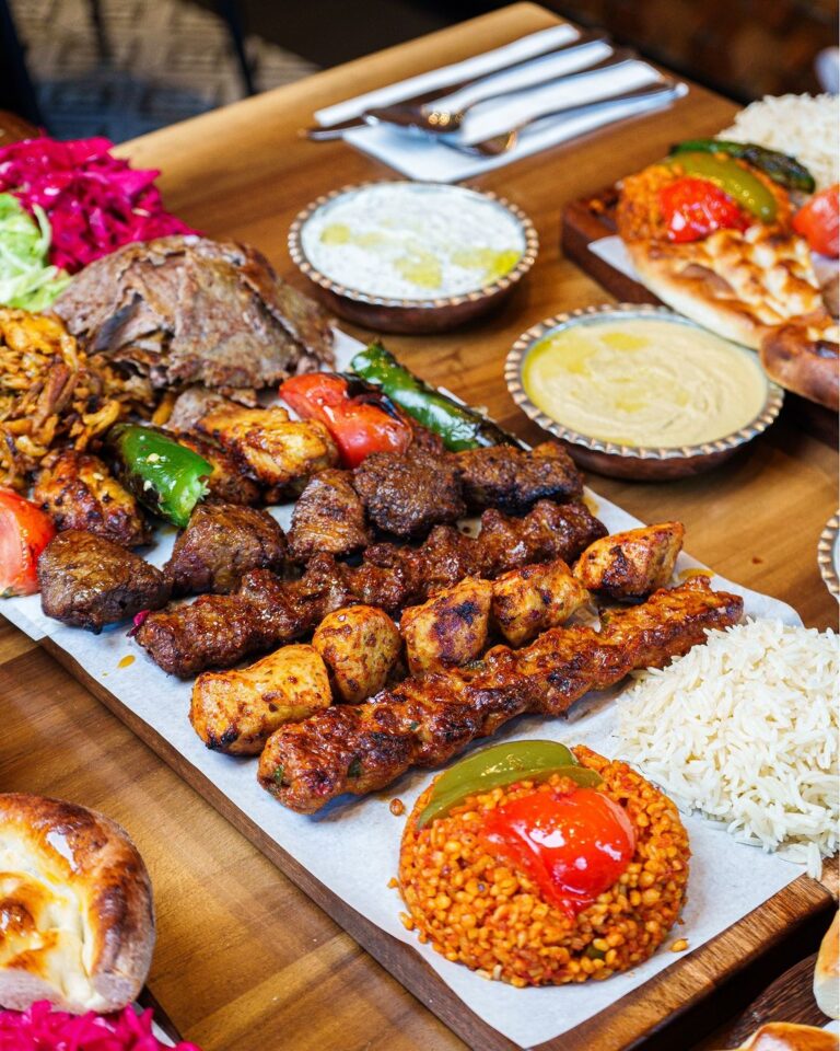 turkish mix platter with chicken shish, adana kebab, meat shish, and doner