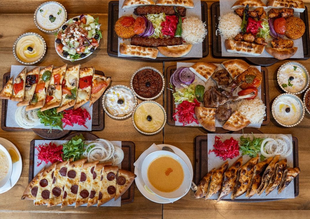 a table with full of turkish food at our Mississauga and kitchener location