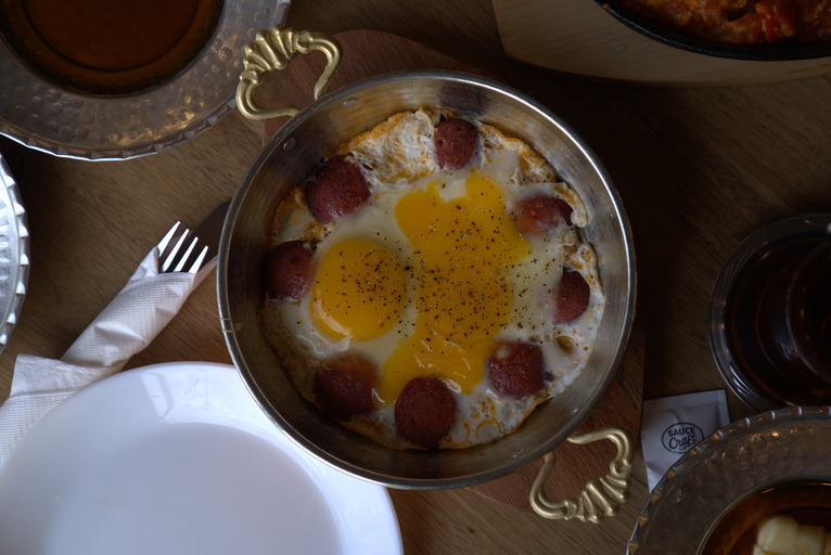 traditional turkish breakfast eggs with sucuk