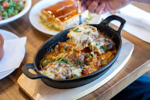 Turkish meatball stew with vegetables and cheese, a hearty choice among the best Turkish food to try